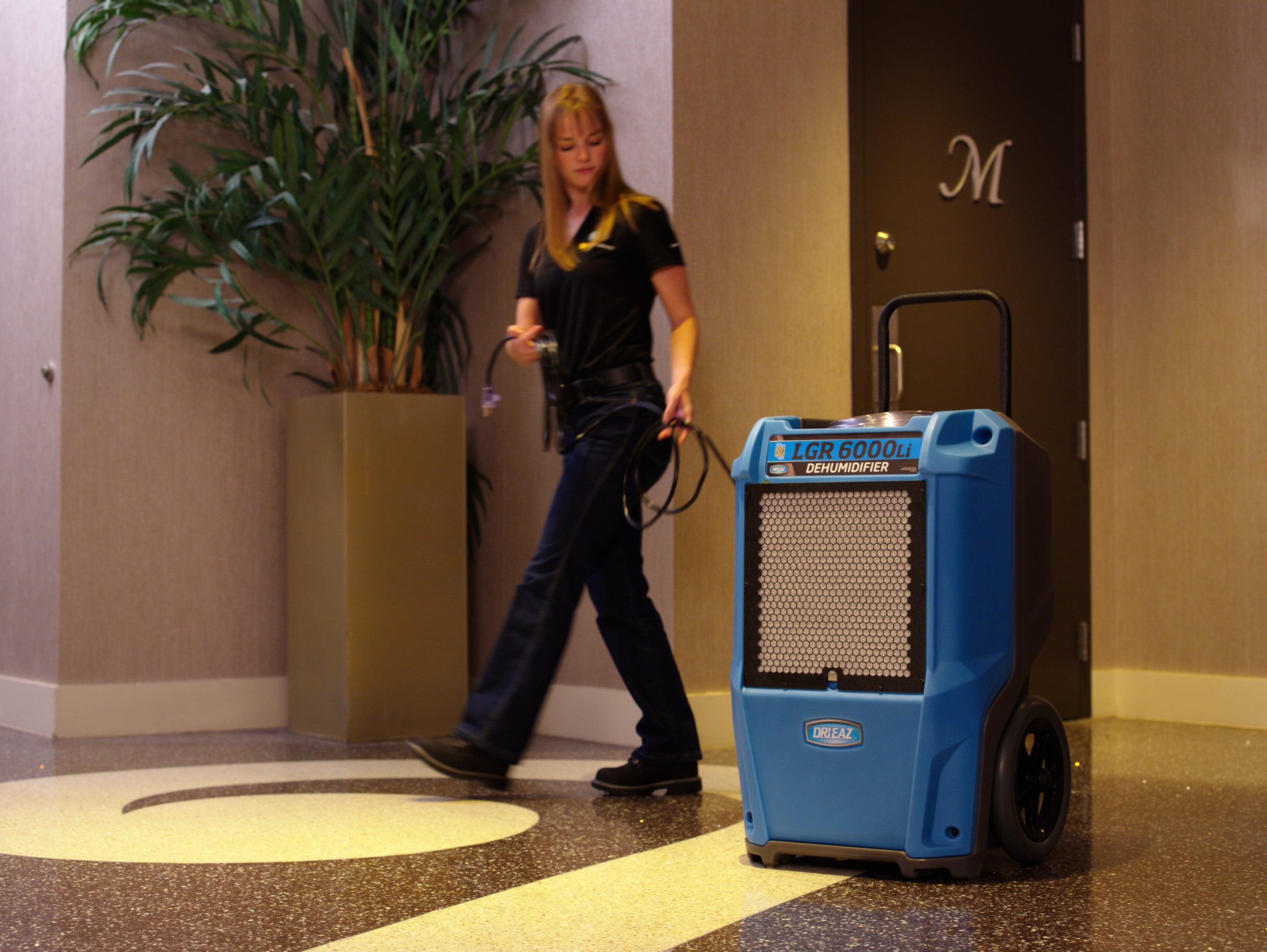 Installing dehumidifier for water damage